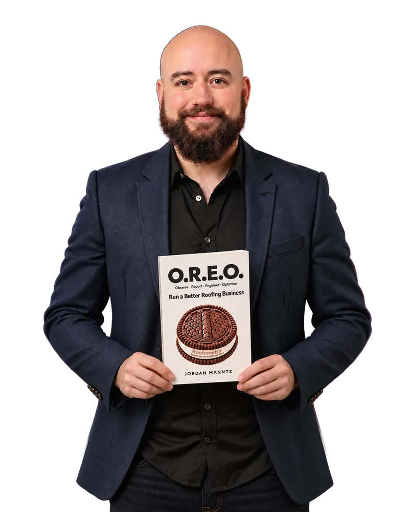Jordan Manntz holding his book O.R.E.O. with both hands